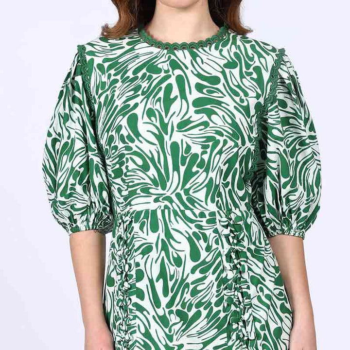 Close-up of puff sleeve and side-lacing on Saint Solene green swirl-print short dress for women UK.