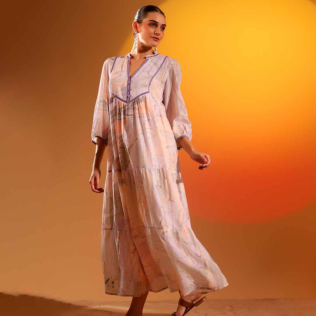 Saint Vaelara lilac marbel dobby maxi dress for women UK, three-quarter front walking view.