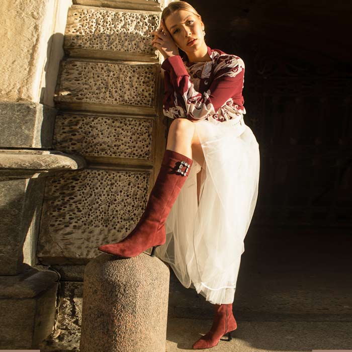 Women's suede knee high boots by Saint Valeria in bordo, styled editorial lifestyle shot