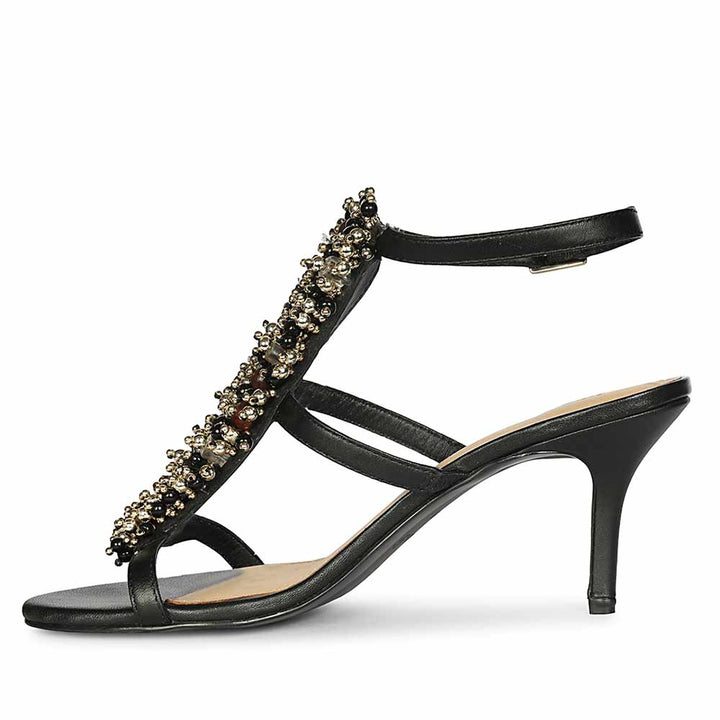 Saint Vesper Embellished Black Leather Stilettos, angled view