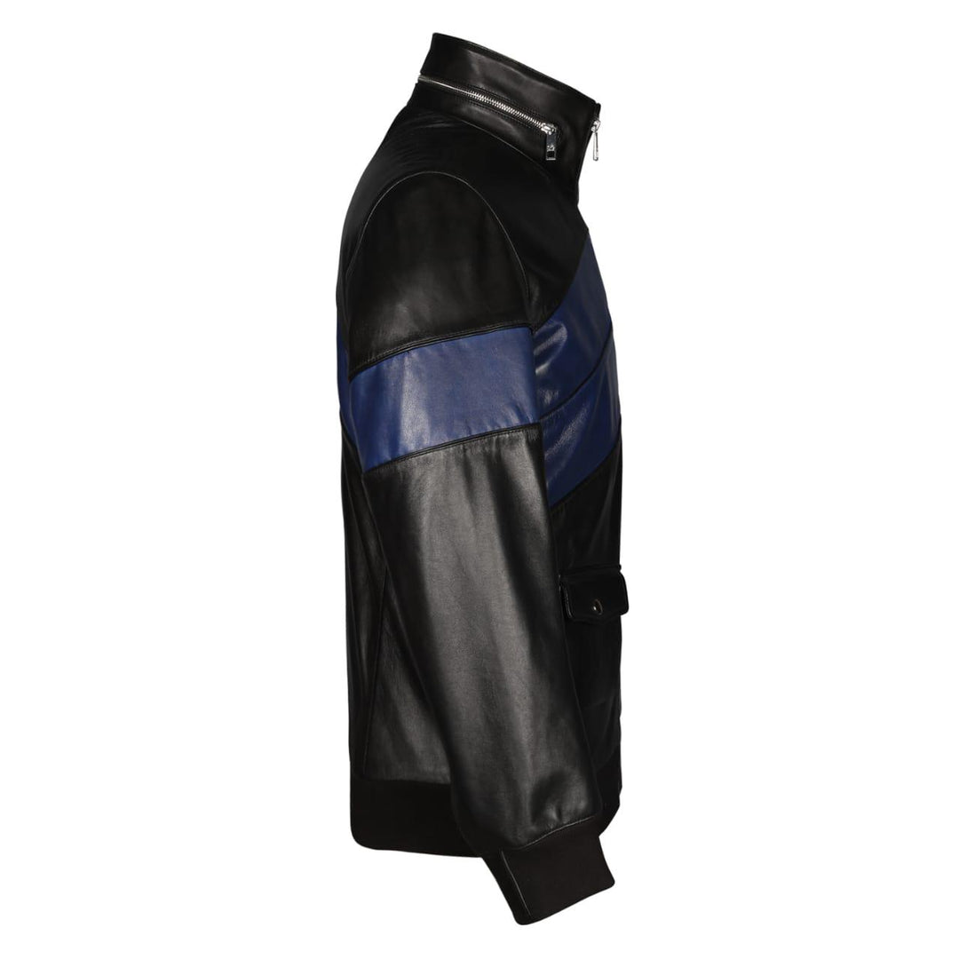 Close-up side view of a black and navy leather jacket's sleeve panel.
