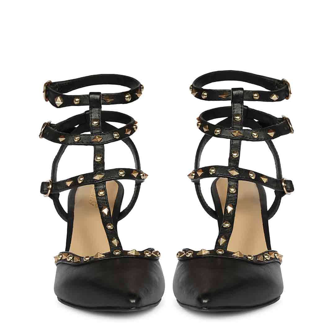 Saint Vorela studded multi-strap black leather stiletto heels with gold stud detailing, front view