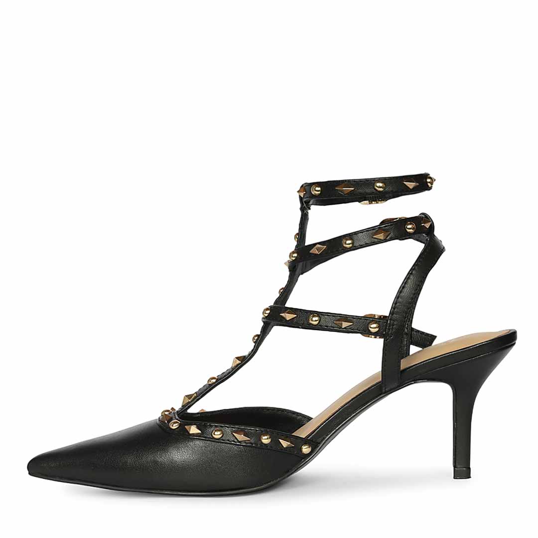 Saint Vorela studded multi-strap black leather stiletto heels with gold stud detailing, left view