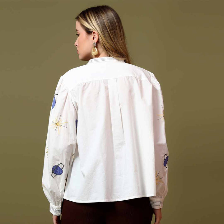 Saint white celestial applique cotton shirt for women UK, back view showing planet and star motif.