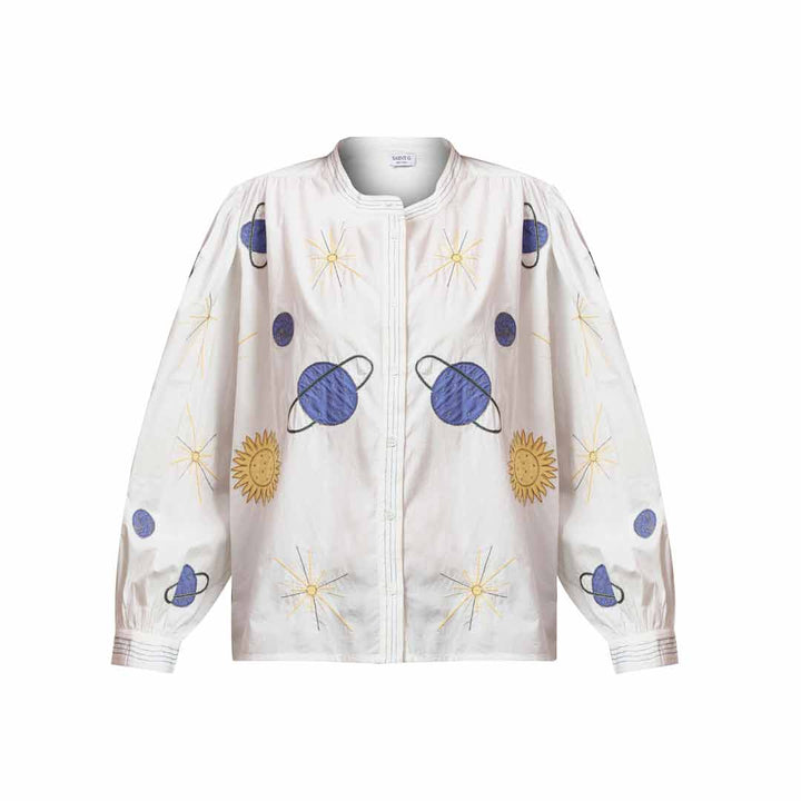 Women's white celestial applique cotton shirt by Saint, shown flat with planet and sun appliqué motif.