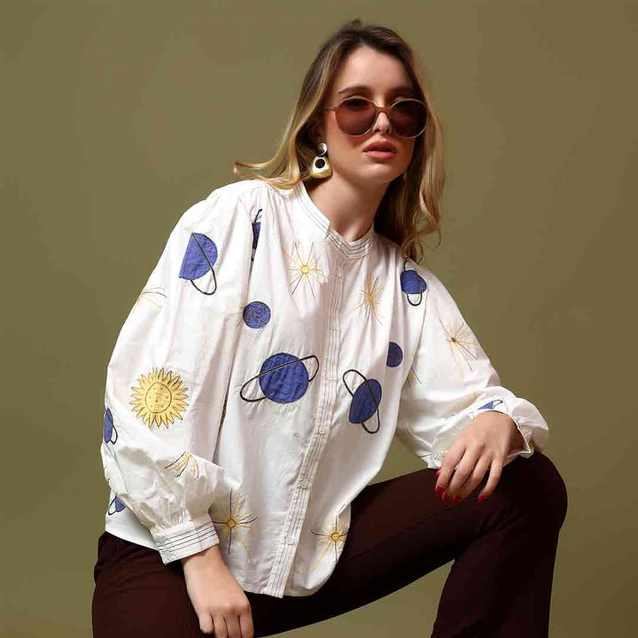 Saint white celestial applique cotton shirt for women UK, front view styled with sunglasses.