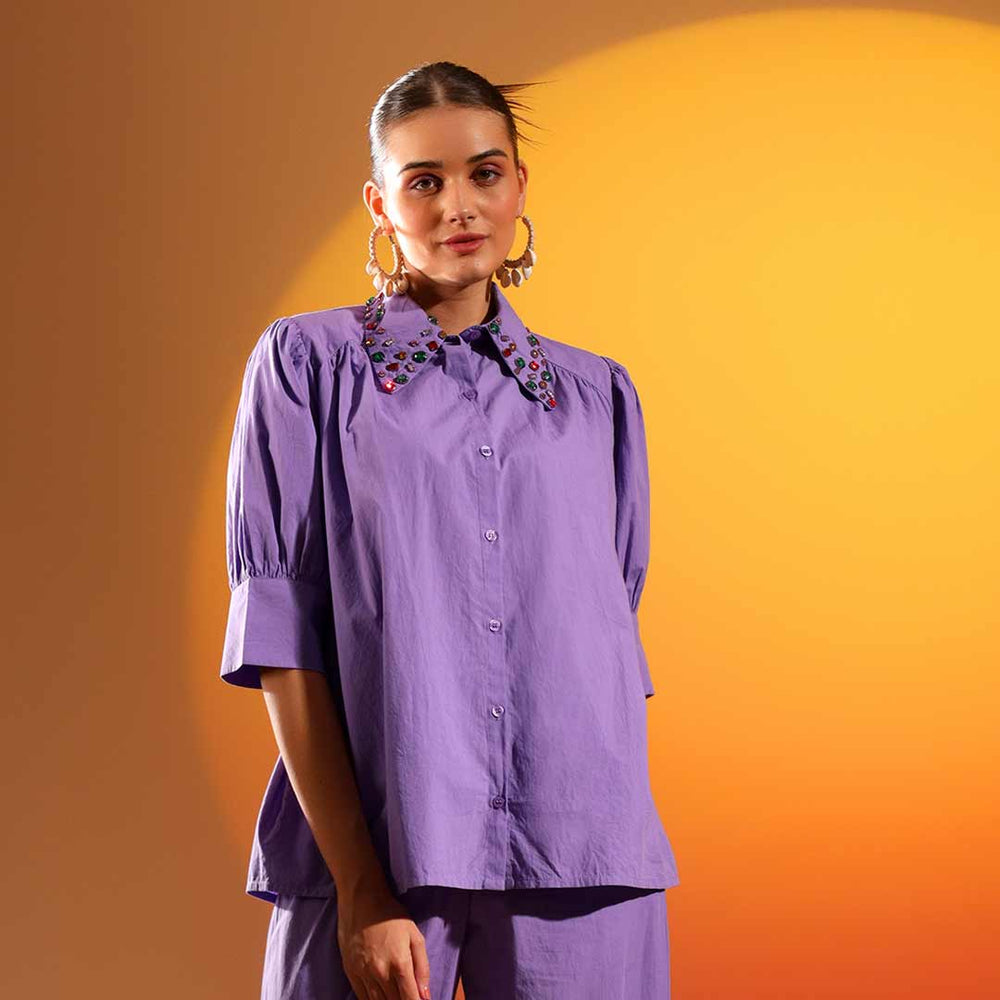 Woman wearing a lilac purple cotton shirt with a jewelled embellished collar.