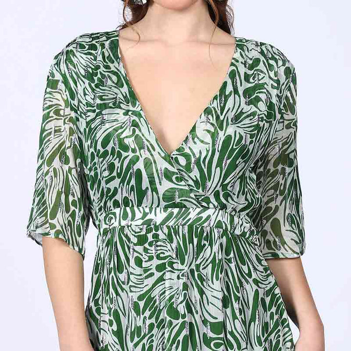 Green and white abstract-print viscose mini dress, shown flat.