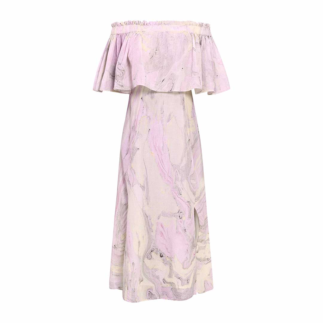 Woman wearing a lilac marbled-print off-shoulder midi dress.