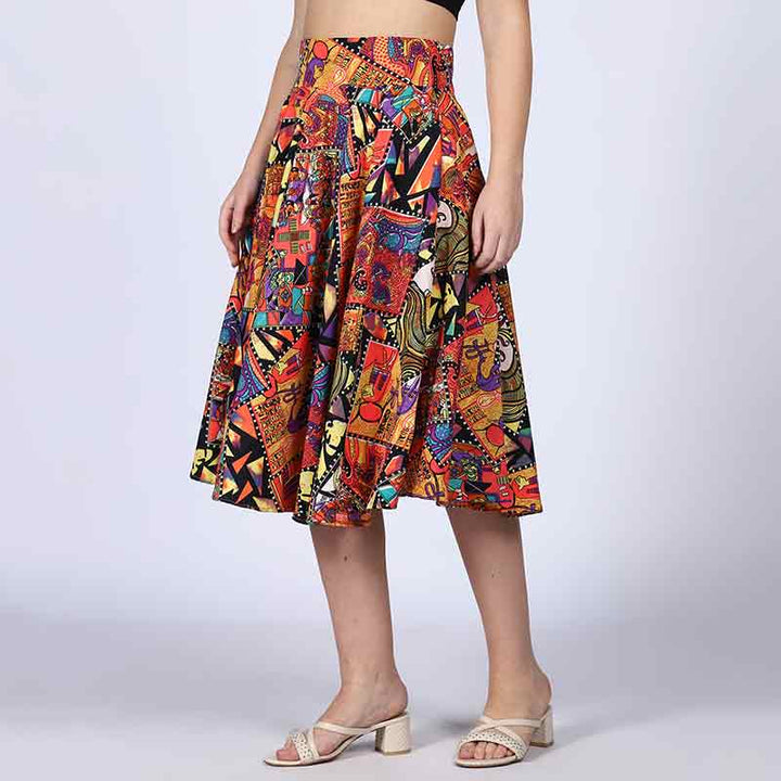 Back view of a woman wearing a multicolour pleated skirt.