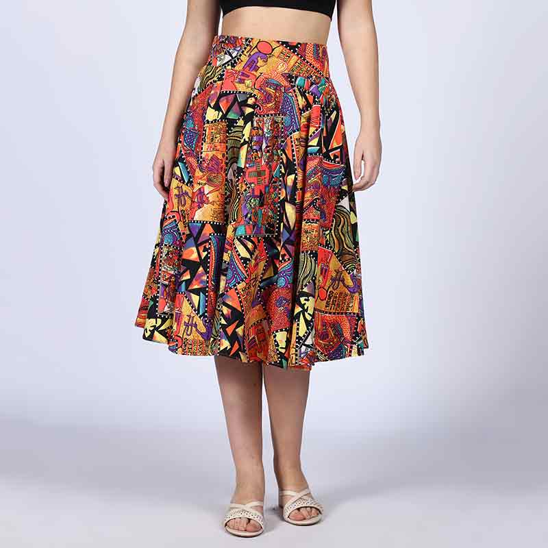 Close-up of the pleats and abstract print on a multicolour skirt.