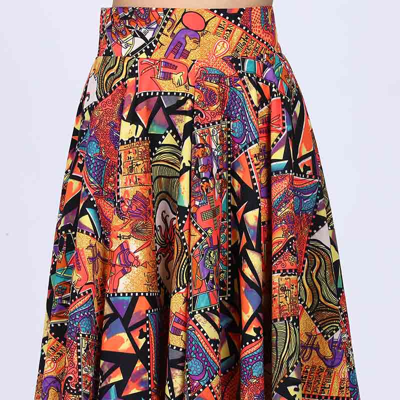 Full-length shot of a woman wearing a multicolour printed pleated skirt.