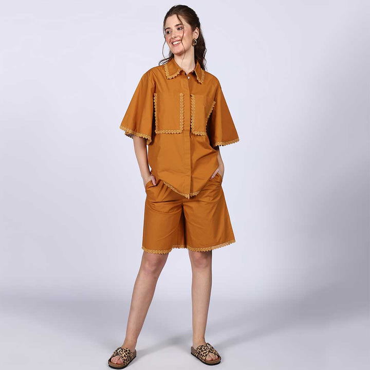 Detail shot of a mustard cotton poplin co-ord set.