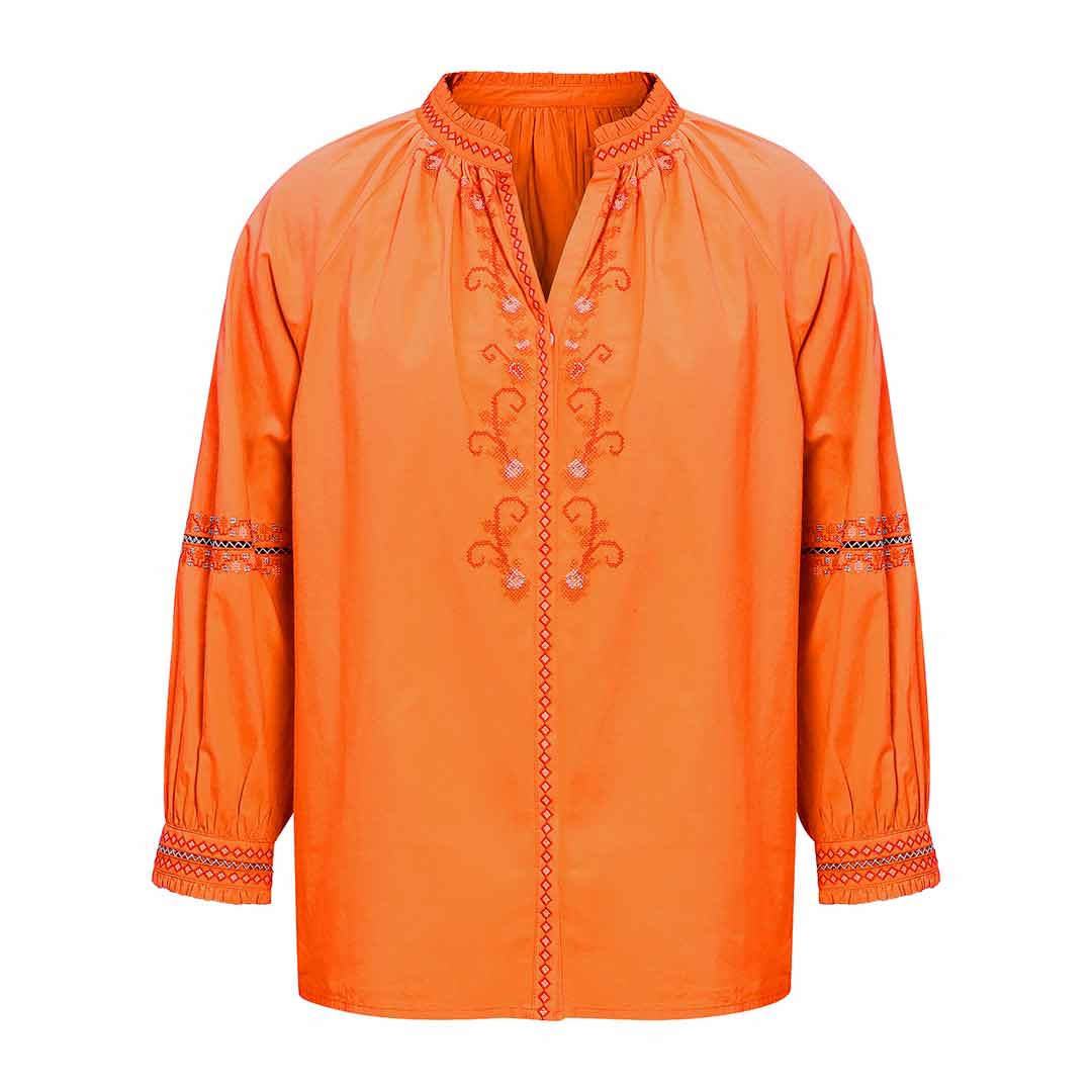 Orange cotton shirt with red embroidered detailing down the front placket, shown flat.