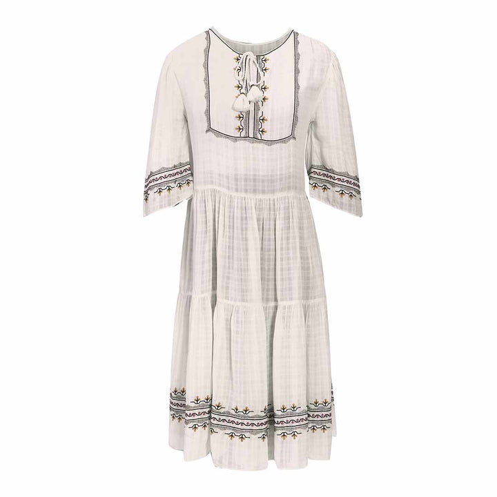 Saint Wynona white check dobby knee-length dress for women UK, shown flat with embroidered bib front and tasselled tie-neck.