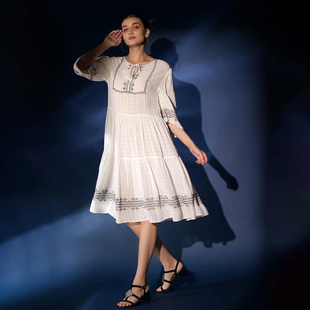 Saint Wynona white check dobby knee-length dress for women UK, front walking view.