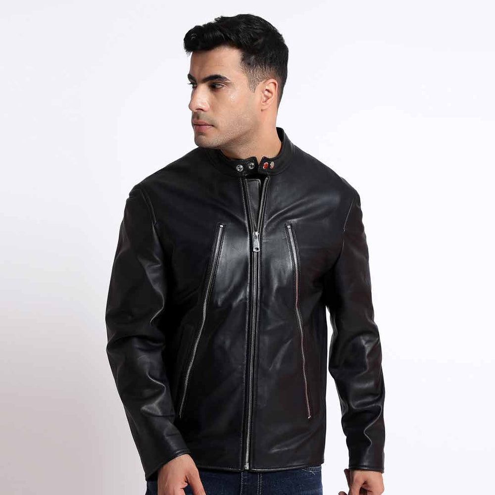 Three-quarter view of a man wearing a black leather cafe racer jacket.
