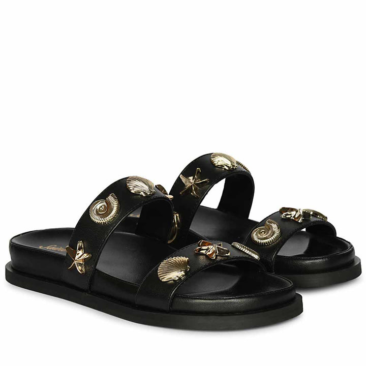 Saint Hallie black leather seashell-studded footbed sandals, angled view
