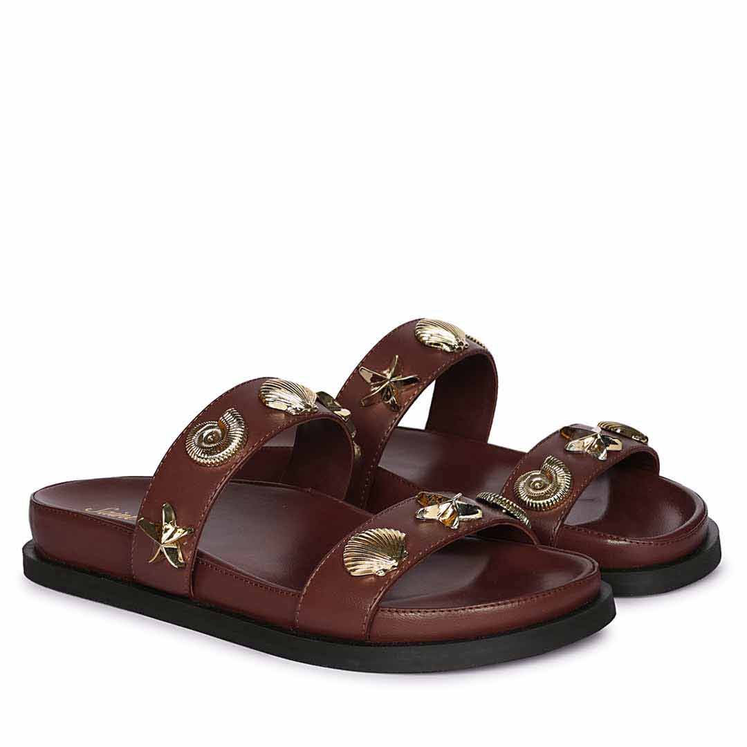 Saint Hallie brown leather seashell-studded footbed sandals, angled view