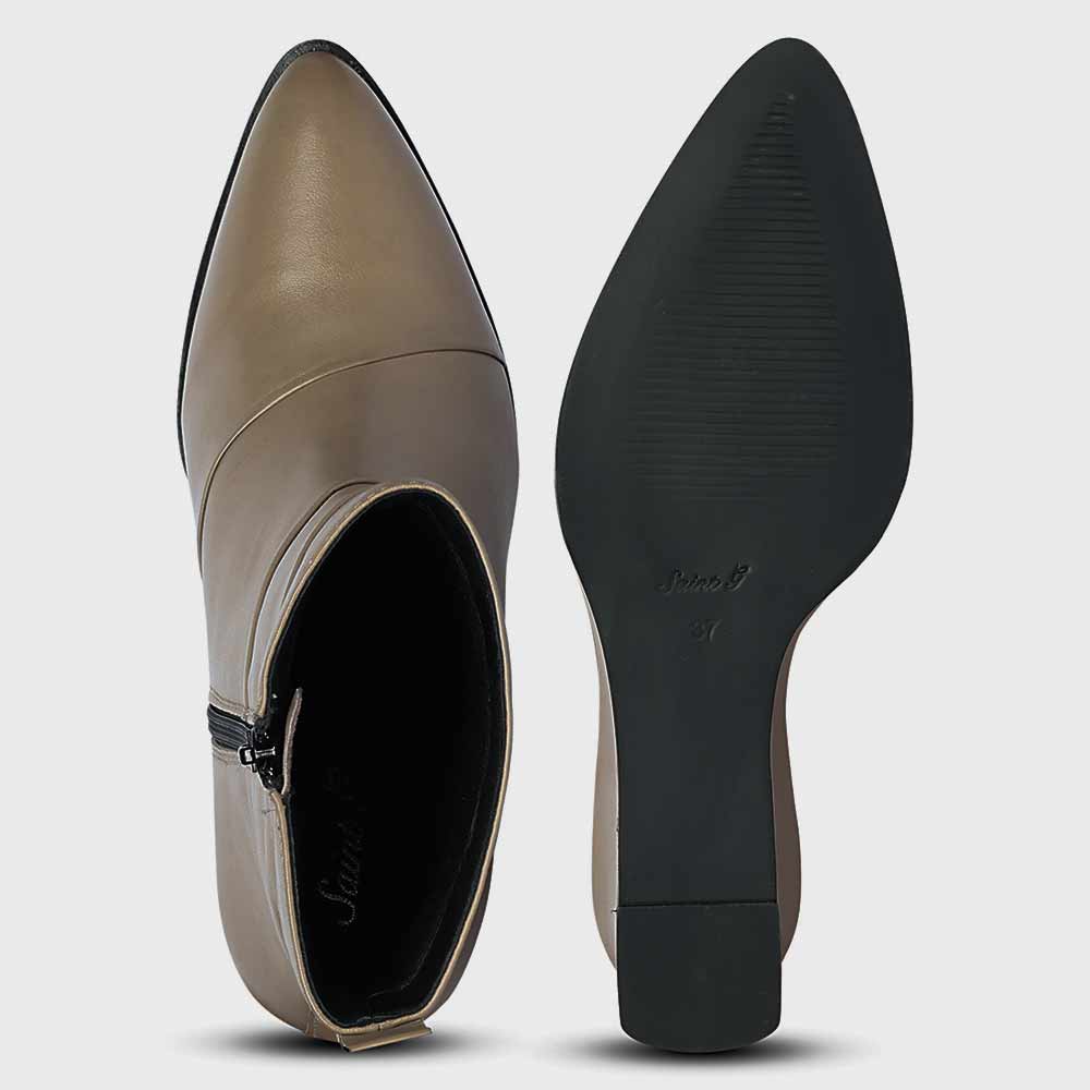 Sole and inside wedge of womens stone leather ankle boots