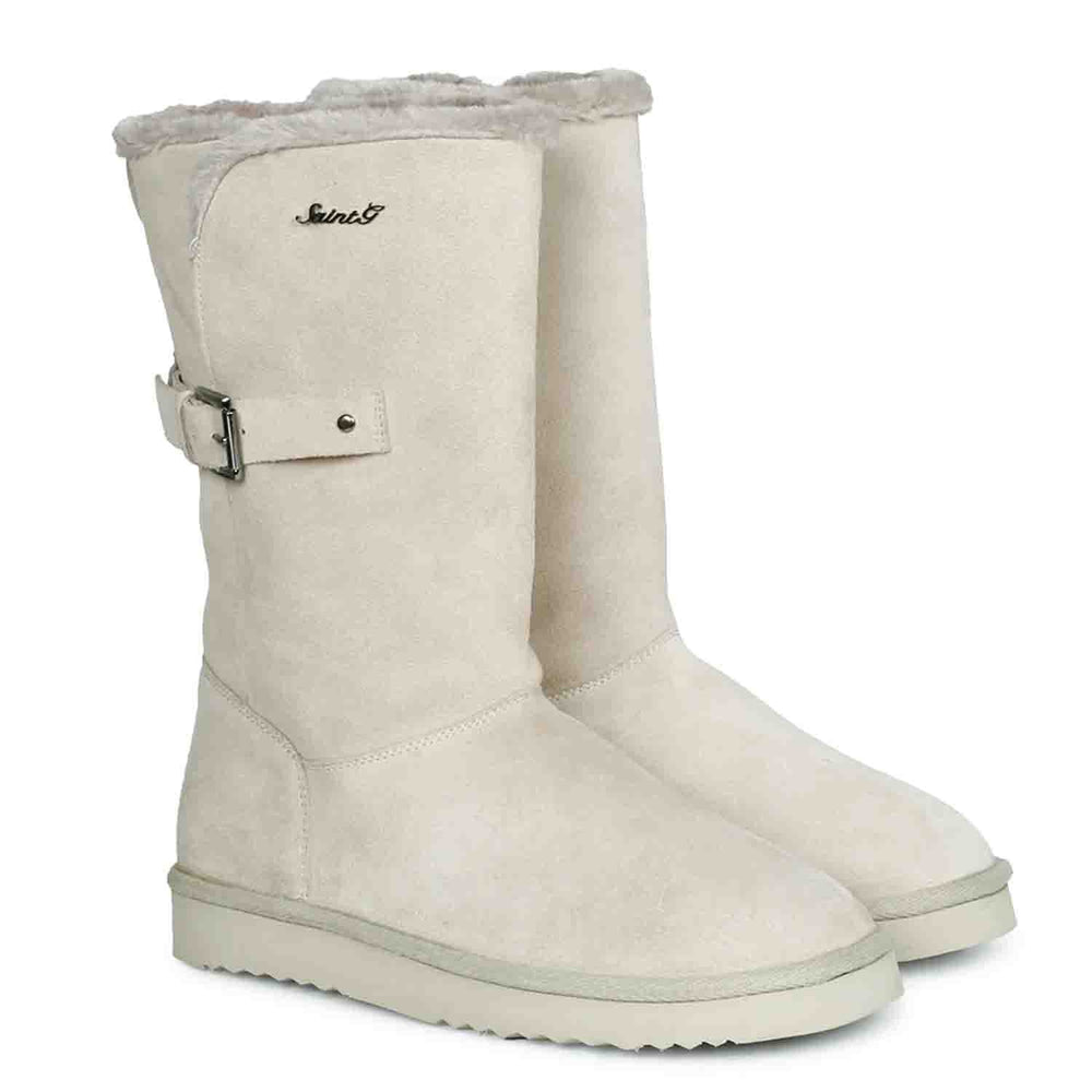 Chic ivory suede boots with decorative buckle, crafted by Saint Aurelia for snug comfort and style