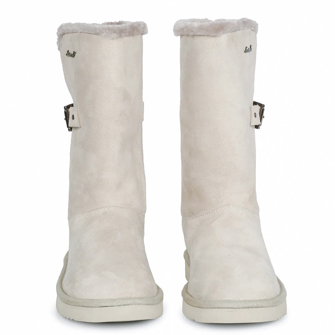 Chic ivory suede boots with decorative buckle, crafted by Saint Aurelia for snug comfort and style