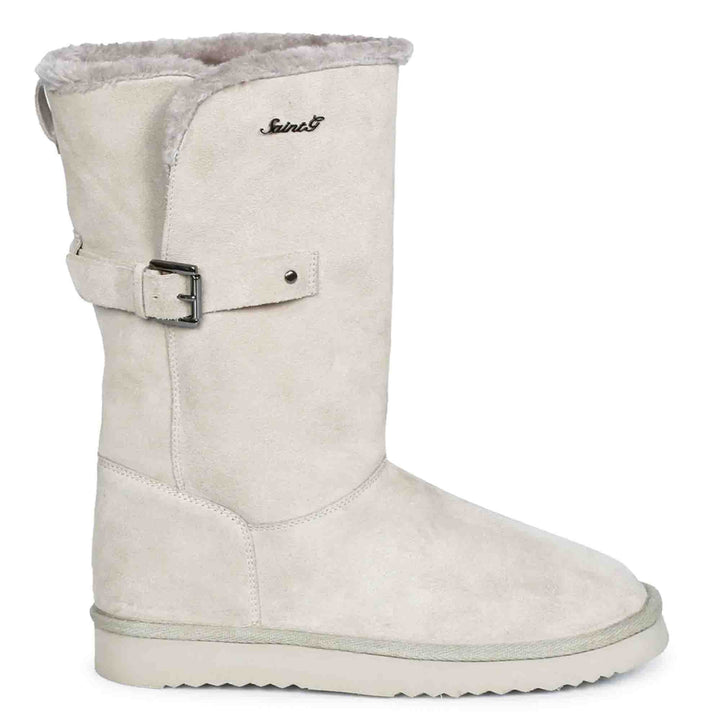 Chic ivory suede boots with decorative buckle, crafted by Saint Aurelia for snug comfort and style