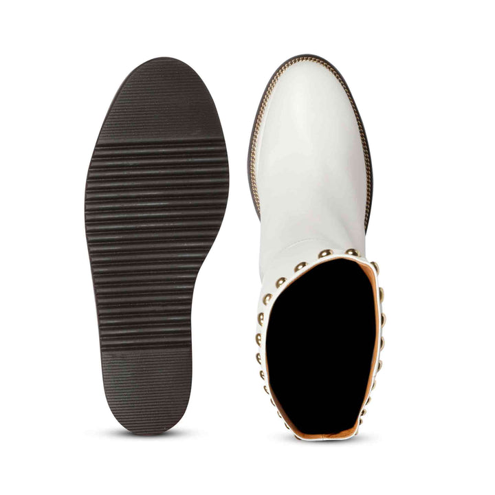 Sole and inside wedge of womens white leather long boots