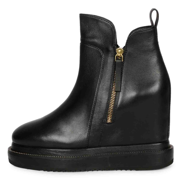 Womens black leather wedge ankle boots, side view