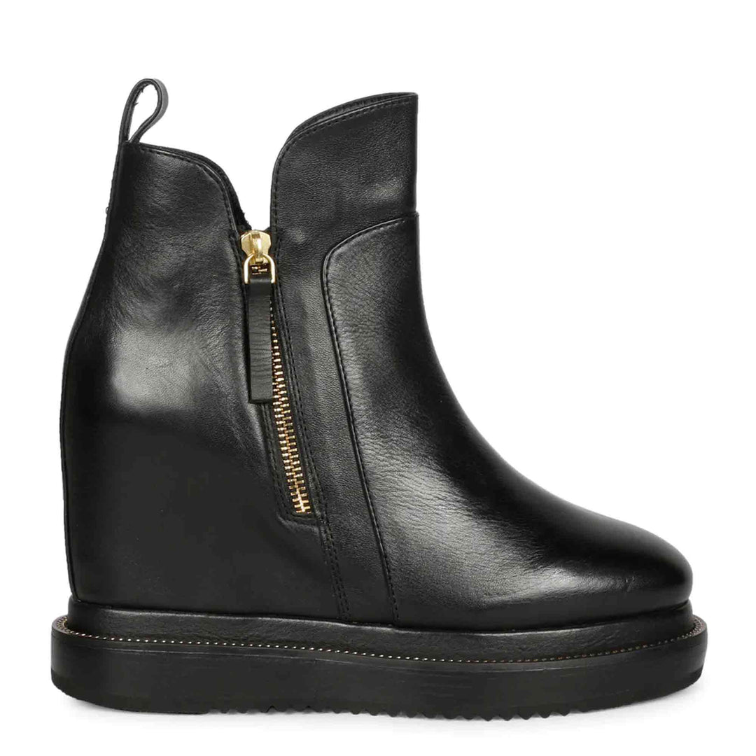 Womens black leather wedge ankle boots with gold side zip, side view