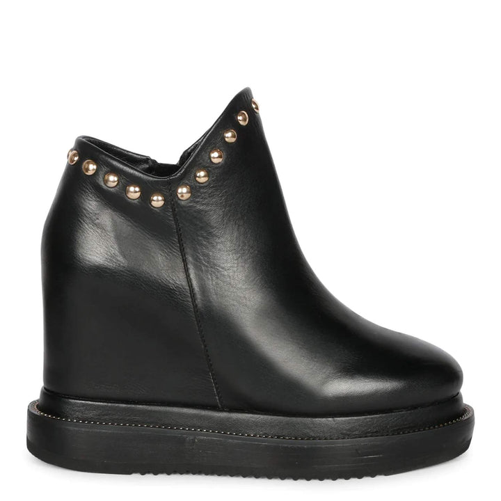 Womens black leather wedge ankle boots with stud detail, side view