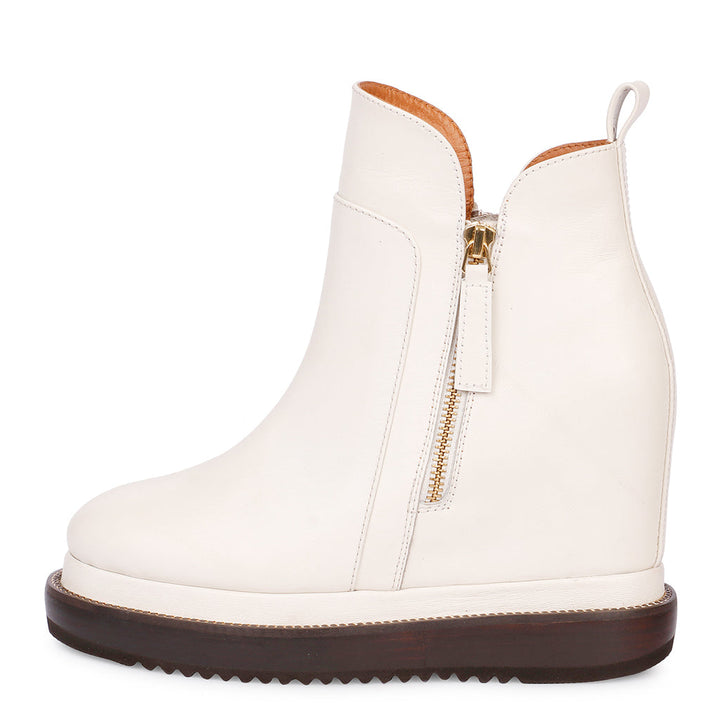 Womens off-white leather wedge ankle boots, side view