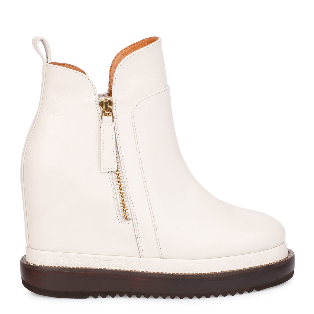 Womens off-white leather wedge ankle boots with gold side zip, side view