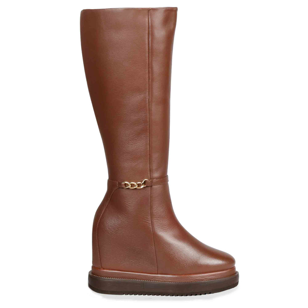 Womens tan leather wedge long boots with chain detail, side view