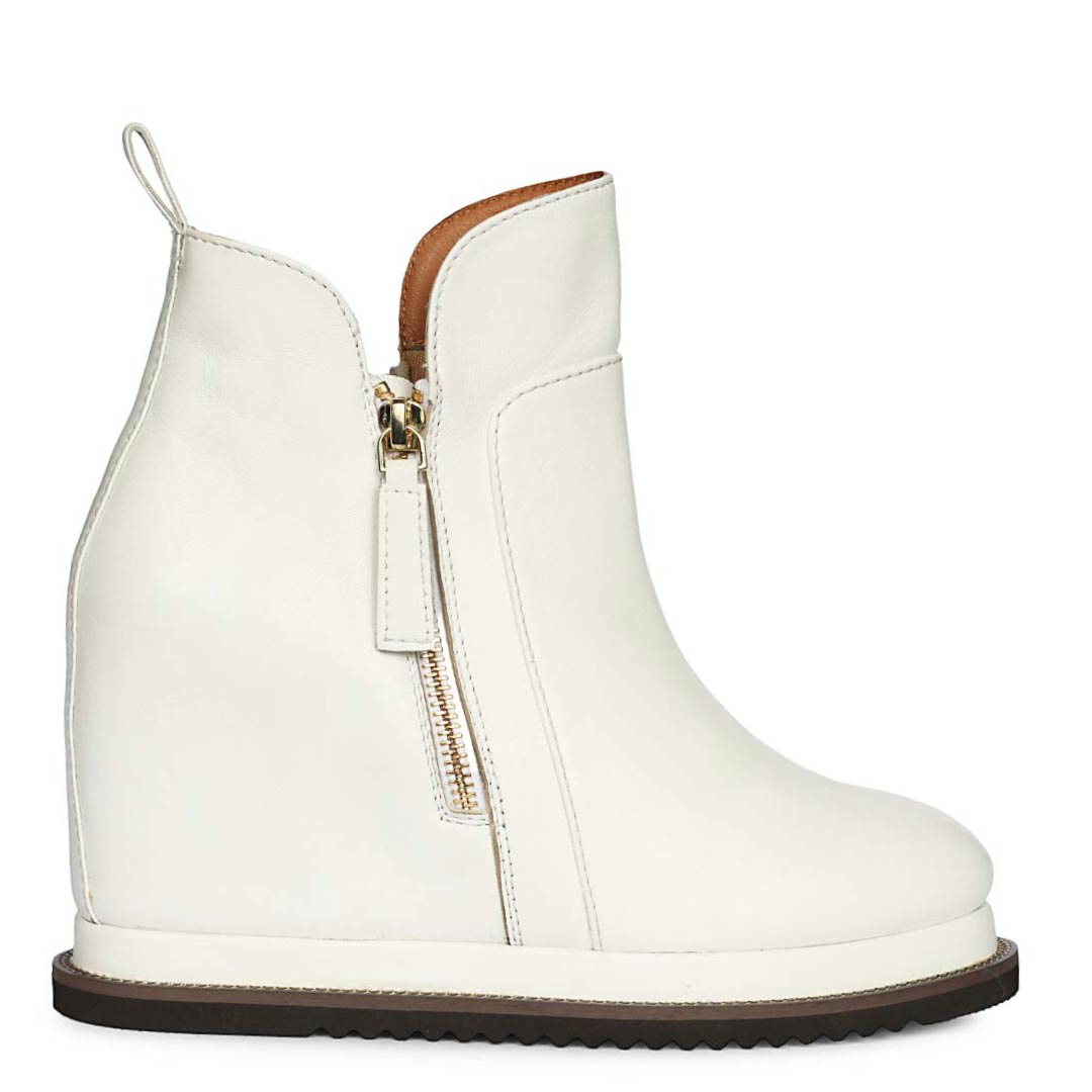 Womens white leather wedge ankle boots with side zip, side view