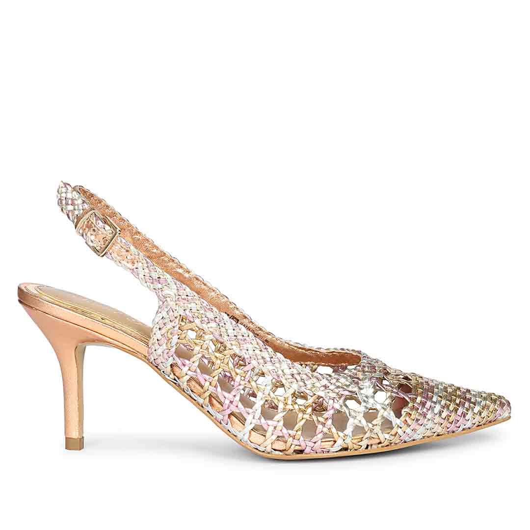 High-heeled shoe with intricate beadwork on a white background