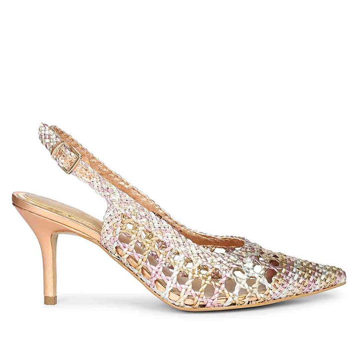 High-heeled shoe with intricate beadwork on a white background